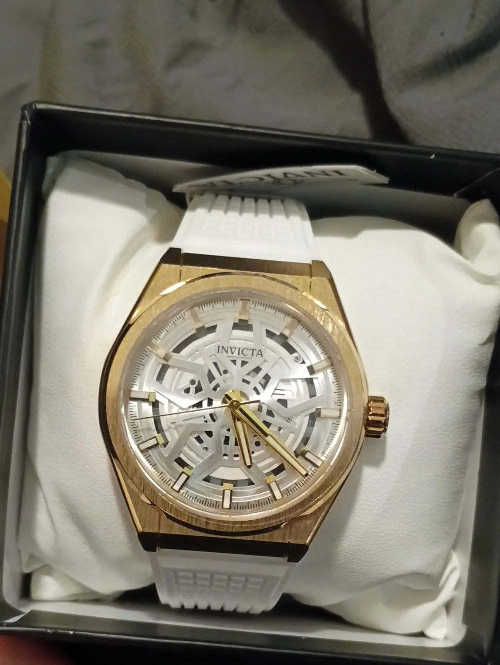 Invicta Gold Tone Case White Strap Skeleton Dial Men’s Watch